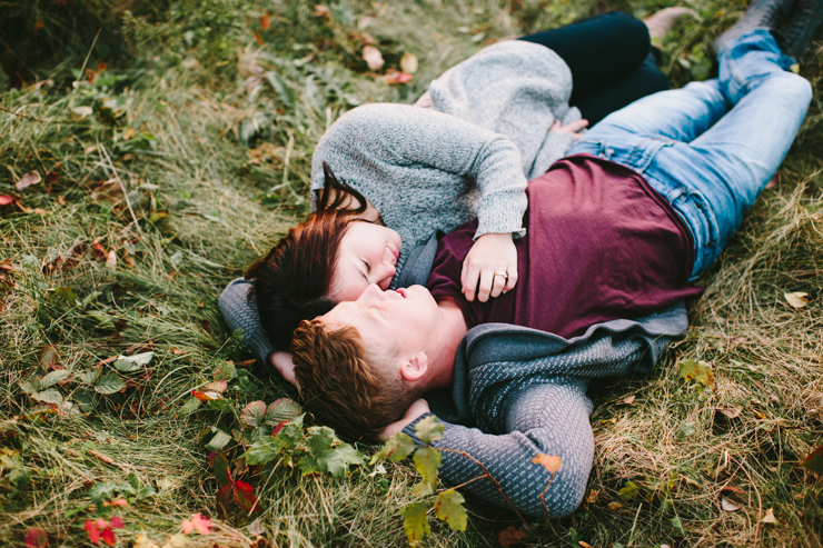 Engagement Photos laying down in a countryside field Peoria IL