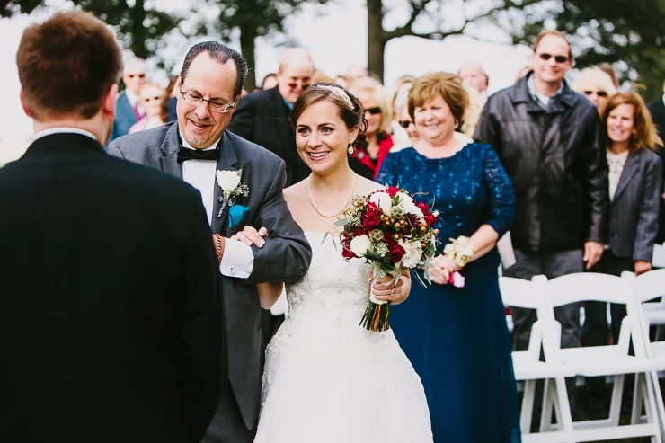 Dad walking his daughter down the aisle outdoor ceremony Kickapoo Creek Winery, Edwards, IL