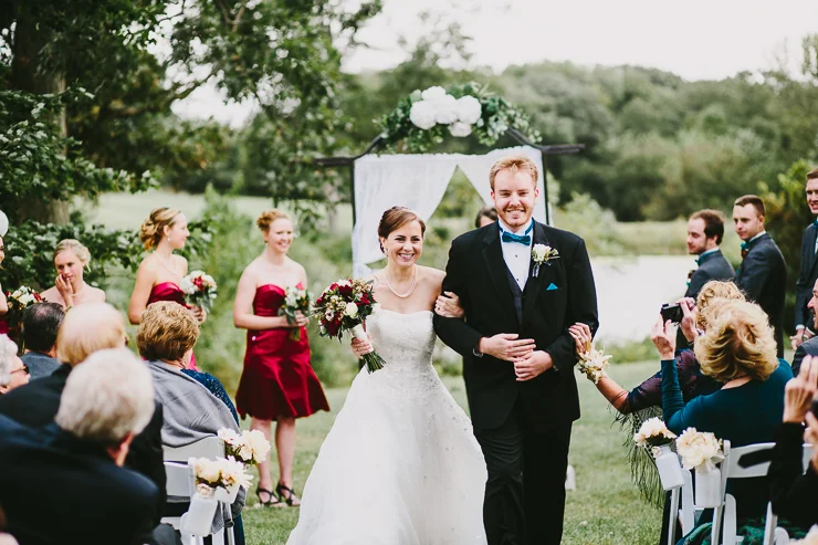 Bride and Groom during outdoor ceremony Kickapoo Creek Winery, Edwards, IL