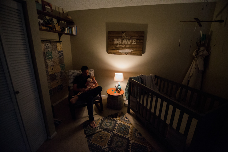 Lifestyle photography in baby's nursery Colorado