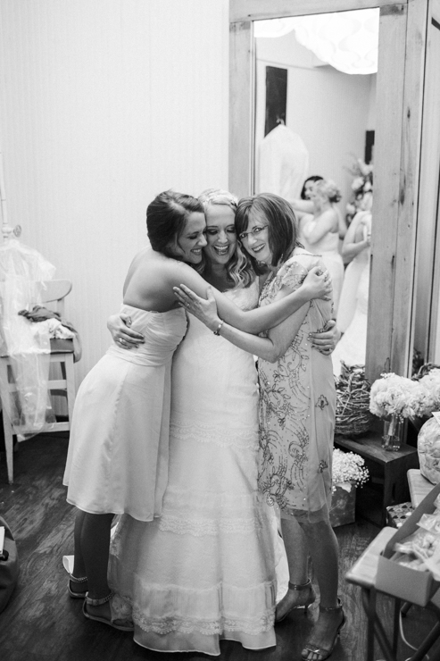 Bride putting on her wedding gown at the Haight, Elgin, Illinois