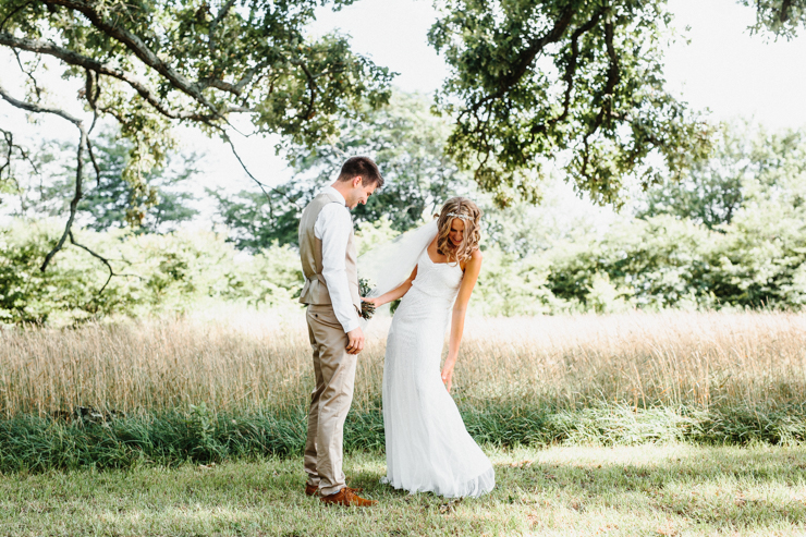 Groom in awe of his bride after a first look, emotional reaction