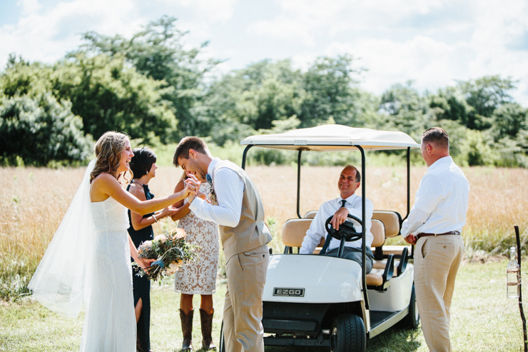 Groom kissing his bride's hand out of excitement after their first look on their wedding day