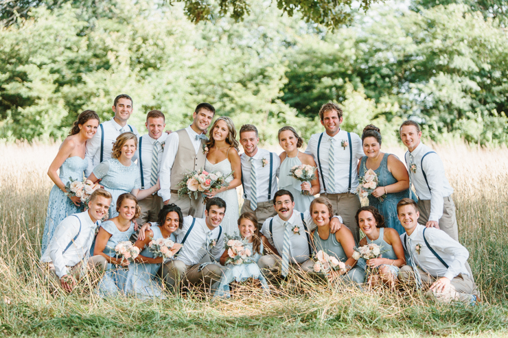Bridal Party wearing tan and blue outdoor in field at the farm