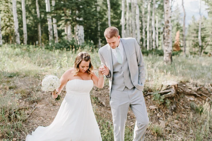 Bride and Groom photography overlooking the Rocky mountains at YMCA of the Rockies, Overlook Chapel Colorado