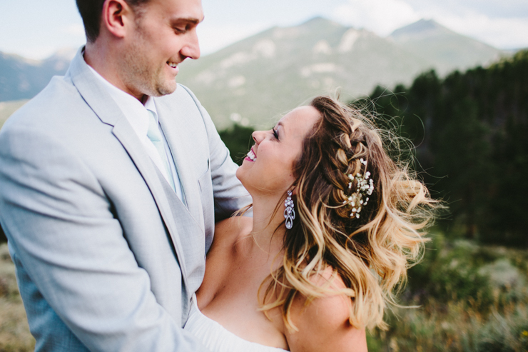 Bride and Groom photography overlooking the Rocky mountains at YMCA of the Rockies, Overlook Chapel Colorado