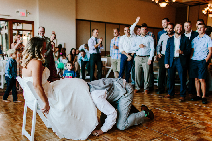Garter toss at wedding reception at Estes Park Resort, Colorado