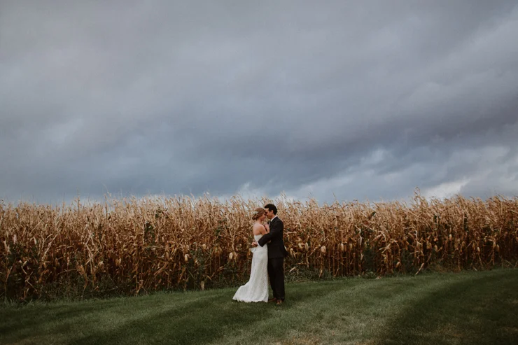 Rainy Outdoor Bride and groom portraits at Pear Tree Estate Champaign, IL