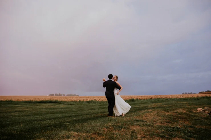 Rainy Outdoor Bride and groom portraits at Pear Tree Estate Champaign, IL