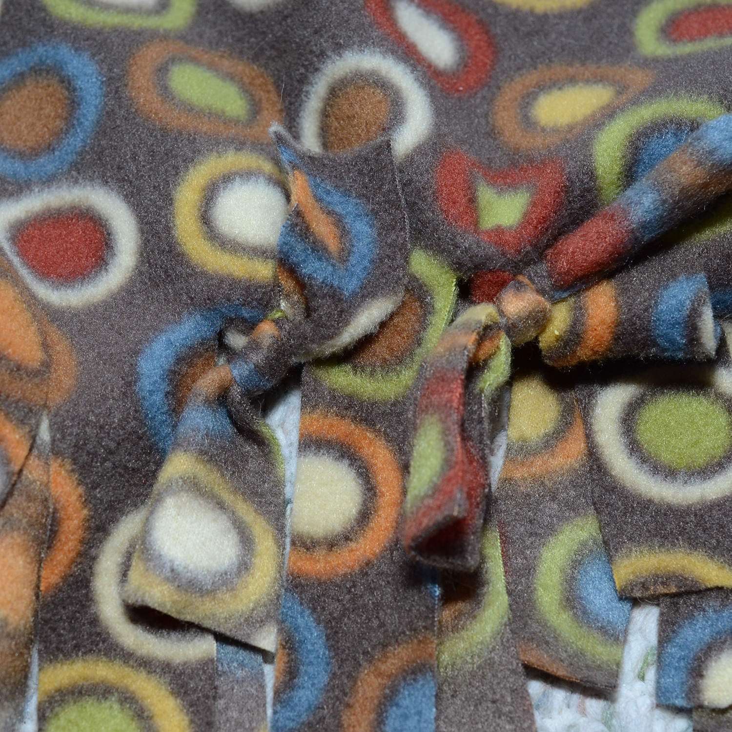Step 6. Tie the knots almost all the way around, leaving a 6 inch section untied so you can stuff.