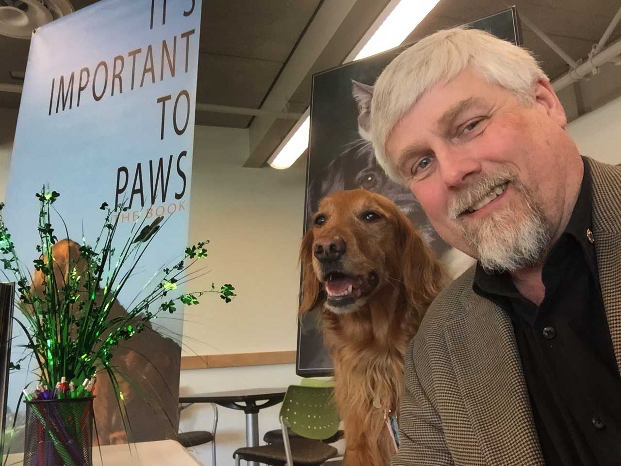 David and Layla at a book signing event - It's Important to Paws