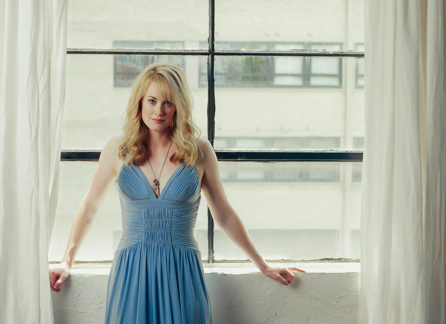 Abigail Hawk - classic blue dress