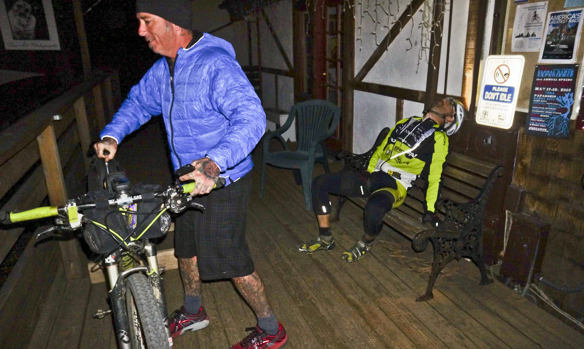Eddie O'Dea, exhausted after 400 miles, as Kevin Hinton helps set his bike aside. Don't idle, Eddie. (c) Josh Spice 2013