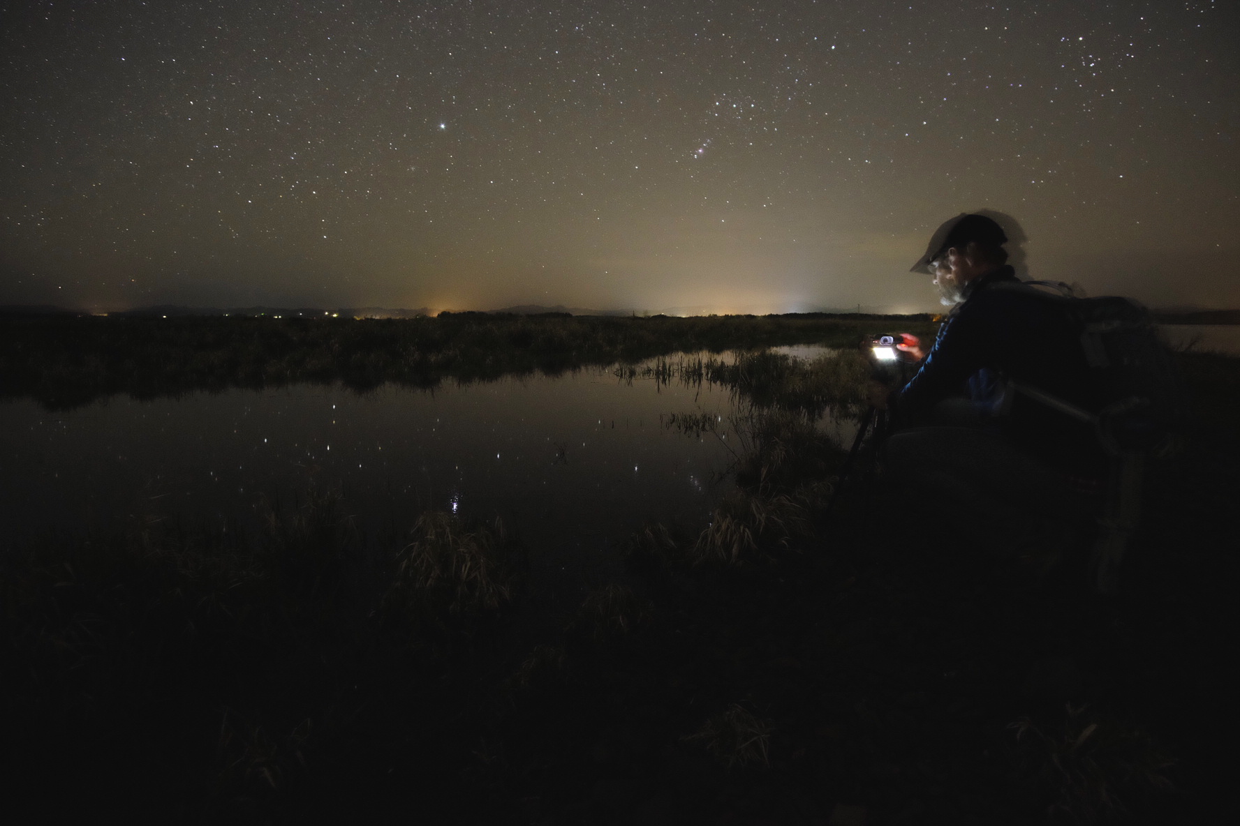 Double Superstars: Dan Bailey shooting the stars reflecting off water with his Fuji X-T1. Shot with my X-T1.