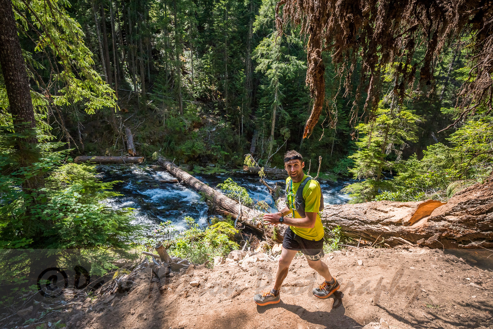 20-some miles into a 50k and smiling. Always. Photo by Paul Nelson Photography