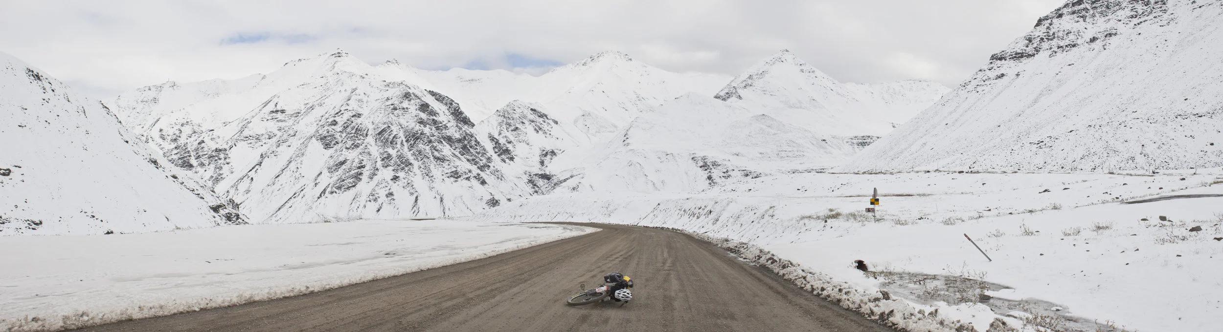 Atigun Pass in Alaska’s Brooks Range. The highest pass on the Alaska road system and the northernmost mountains in North America. An early and unexpected fall snowstorm blanketed the mountains.