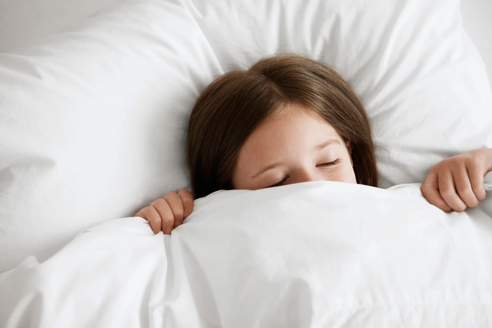 Girl-under-comforter.jpg