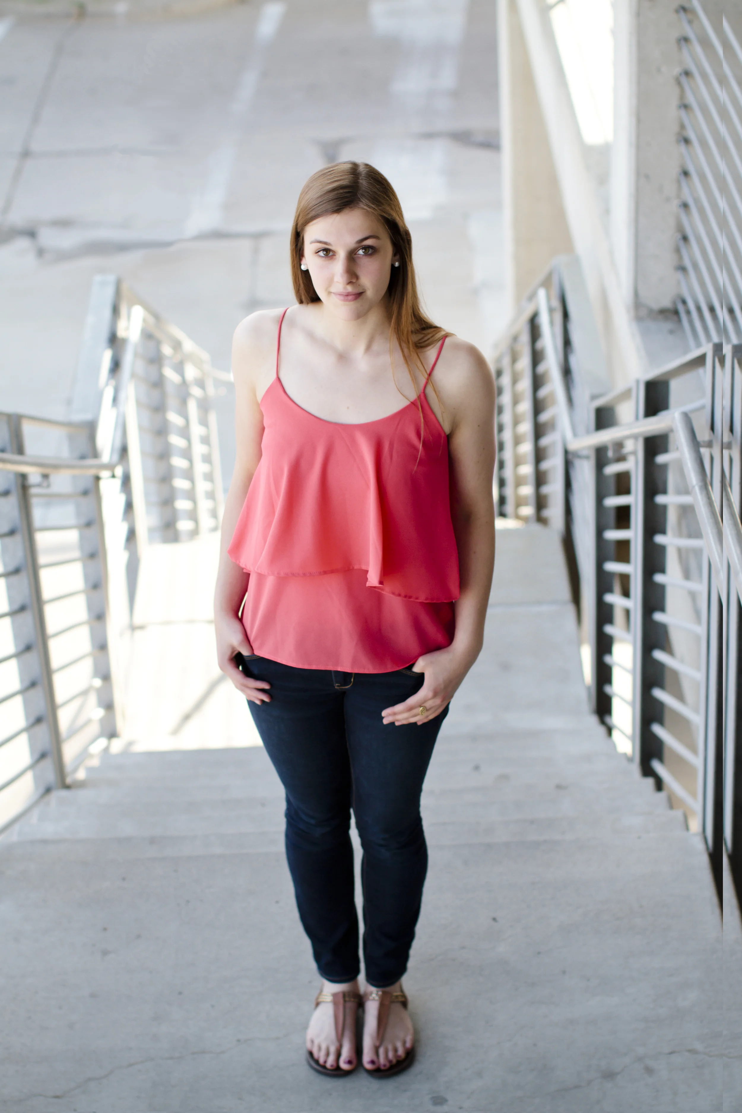 Des Moines Roosevelt Senior Photo in Downtown Des Moines. Natural Light, modern and artistic photography. - Blue Lime Photography