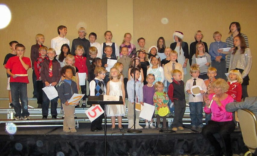The Kinderchor performing at a Christmas party.