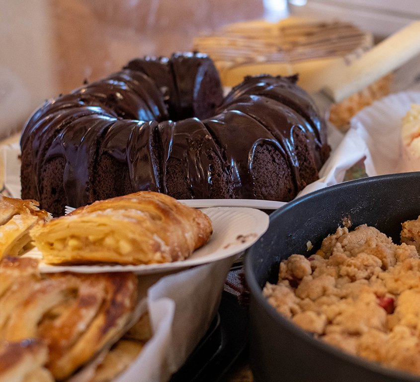 Close-up of home-made cakes for sale at a past lawn program.