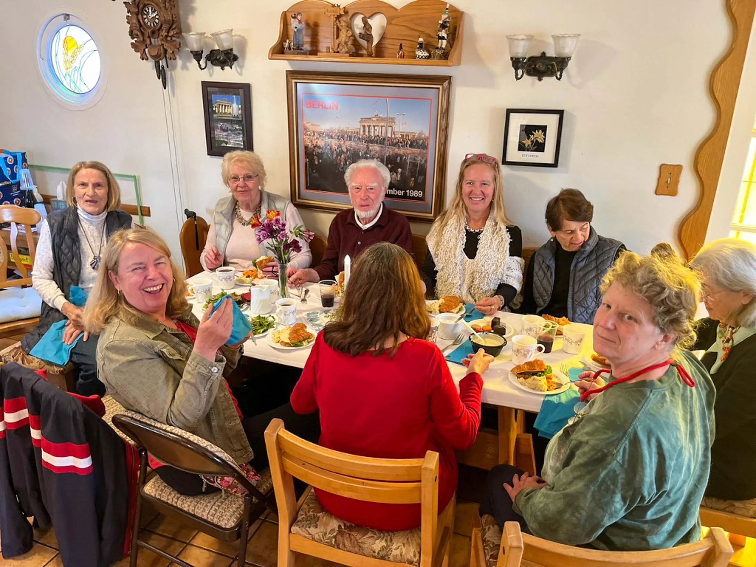 A group of House of Germany members enjoying a meal at Kaffeeklatsch