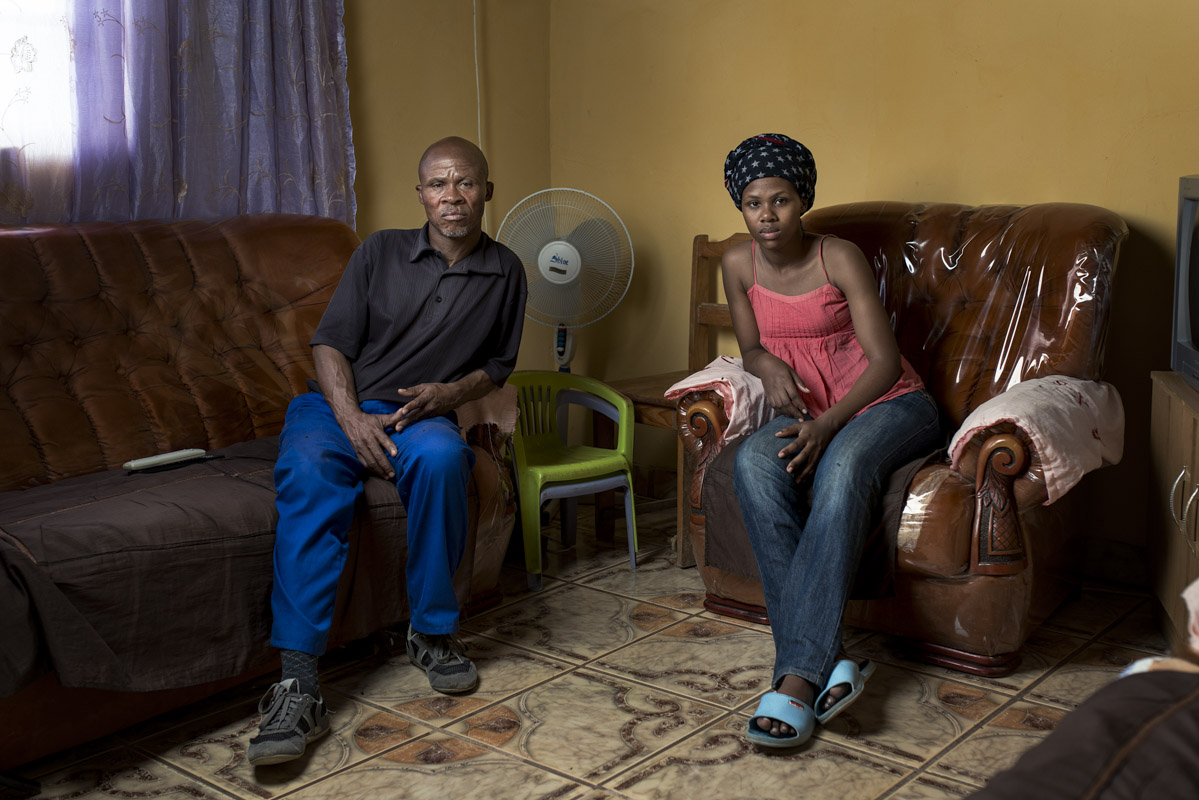 Bangumzi Balakazi at home with his daughter Zintathu