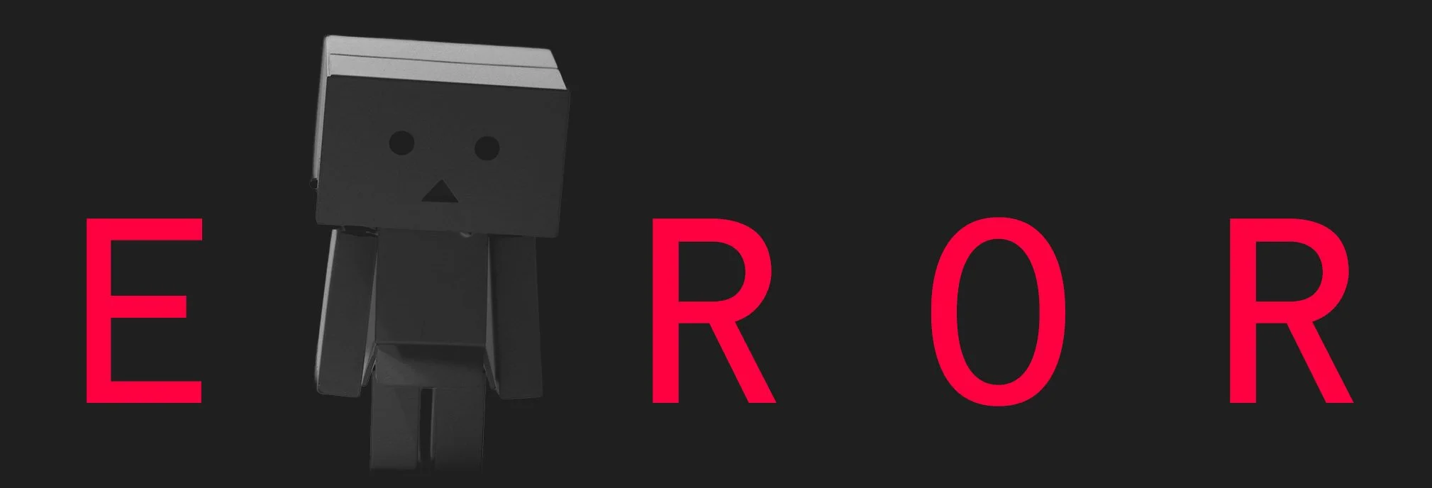 A black and gray robot character with a boxy head and simple facial features standing next to the word 'ERROR' in bold red letters on a dark background.