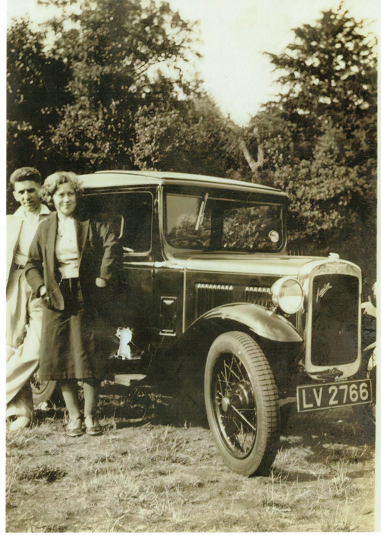 Frank with wife and car_auto_x2_light_ai.jpg