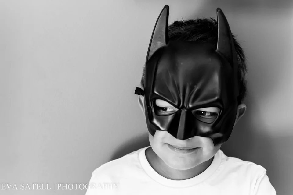 He decides to play Batman and cooperates with a mini session. I catch him making some serious and goofy faces.