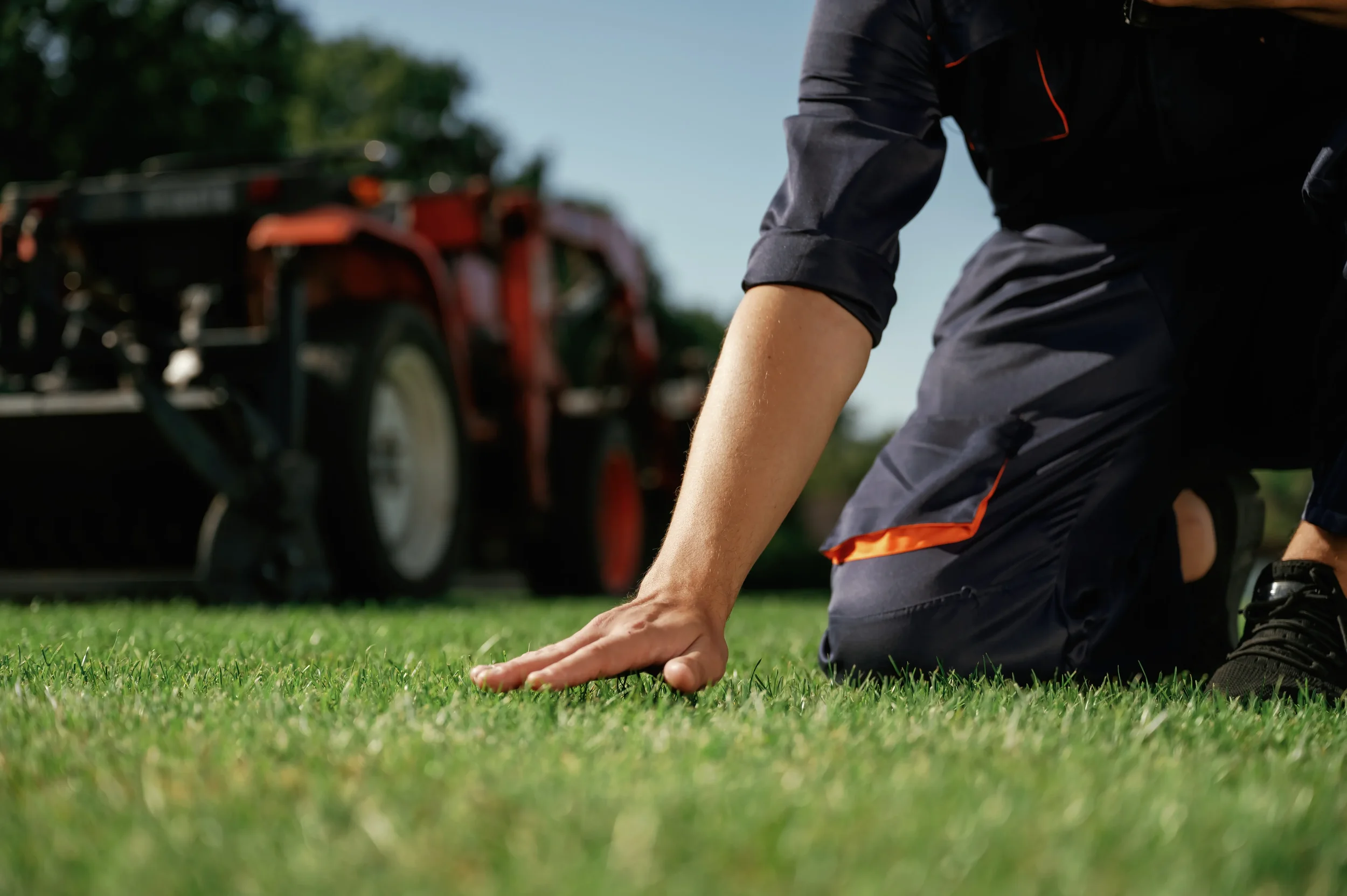 touching-the-grass-man-is-with-utility-tractor-wi-2026-03-24-06-03-04-utc.webp
