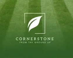 Cornerstone Lawn Services logo featuring a white leaf icon over a striped green grass background.