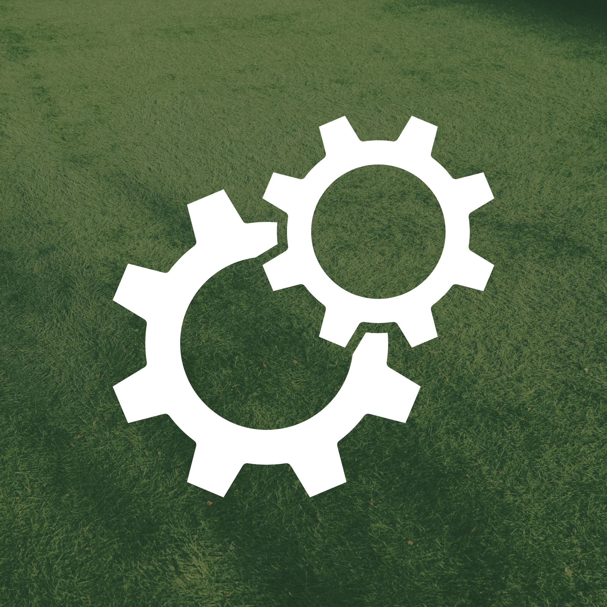 Small green square icon with a white outline of two interlocking gears.