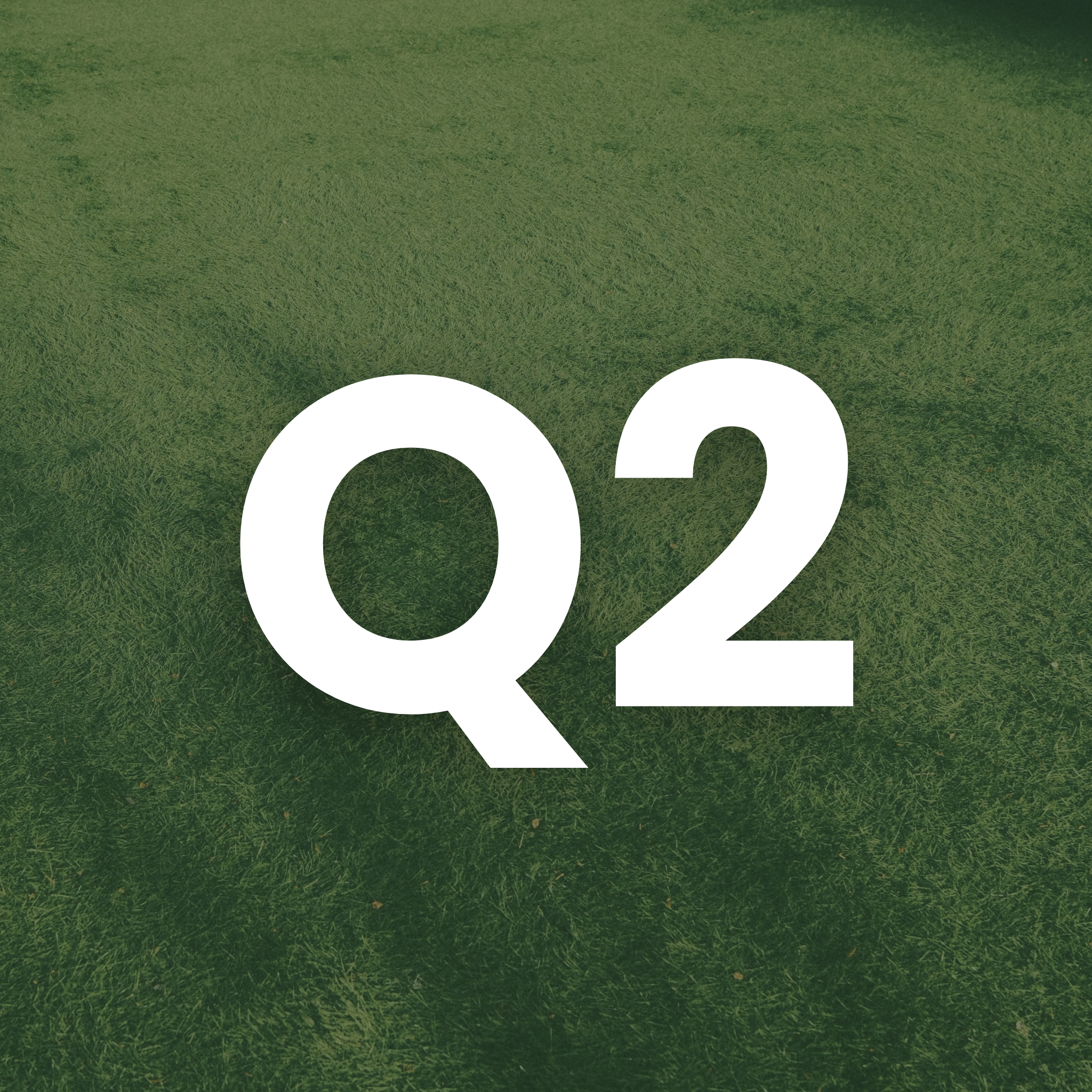 A small square icon featuring the white text "Q1" set against a blurred background of a green lawn.