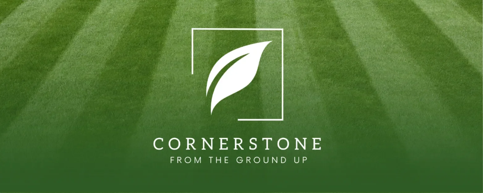 Cornerstone Lawn Services logo and slogan "From the Ground Up" over a professionally striped green lawn.