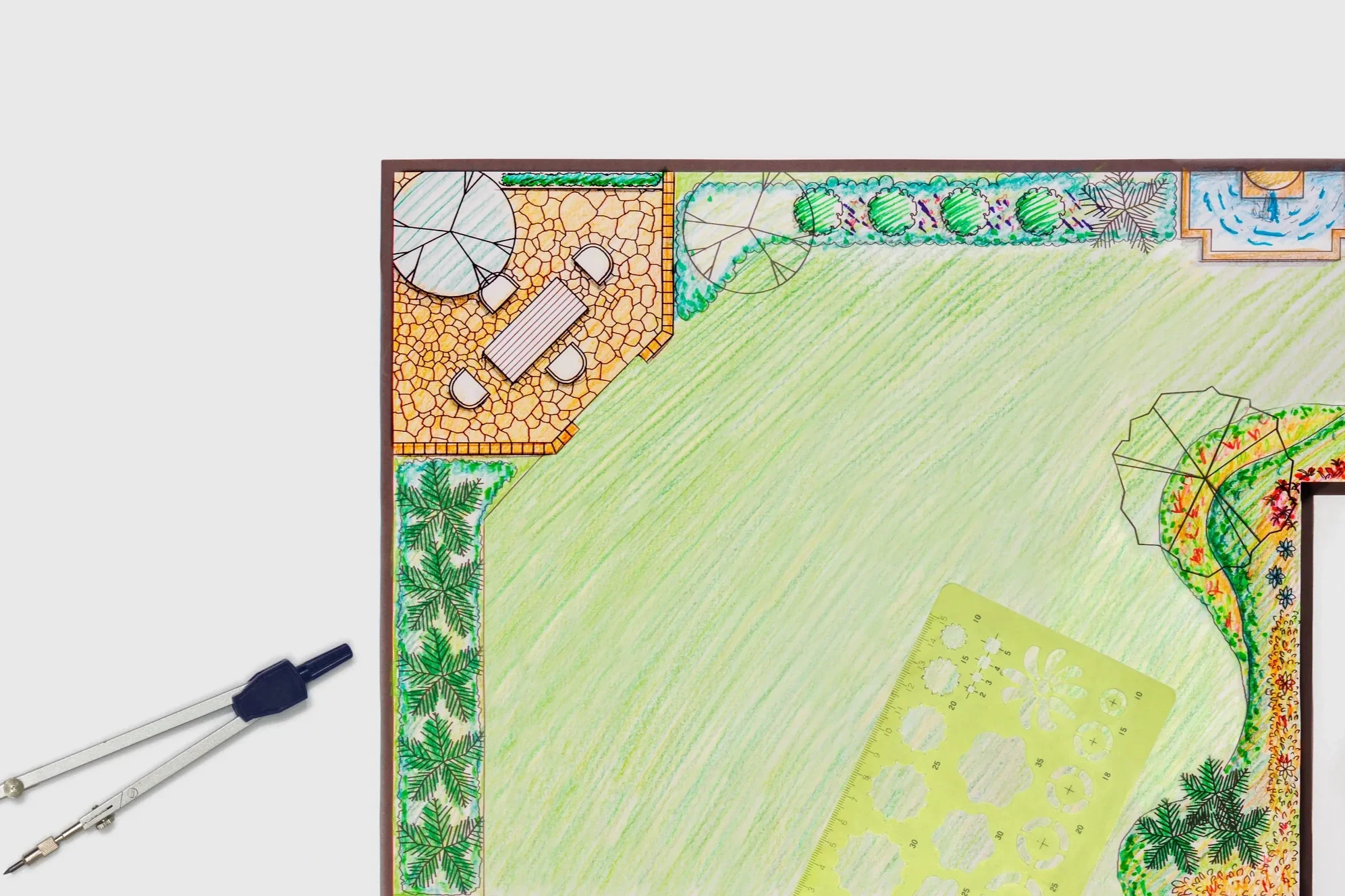 Custom landscape design blueprint featuring a patio, lawn layout, and planting beds by Cornerstone Lawn Services.