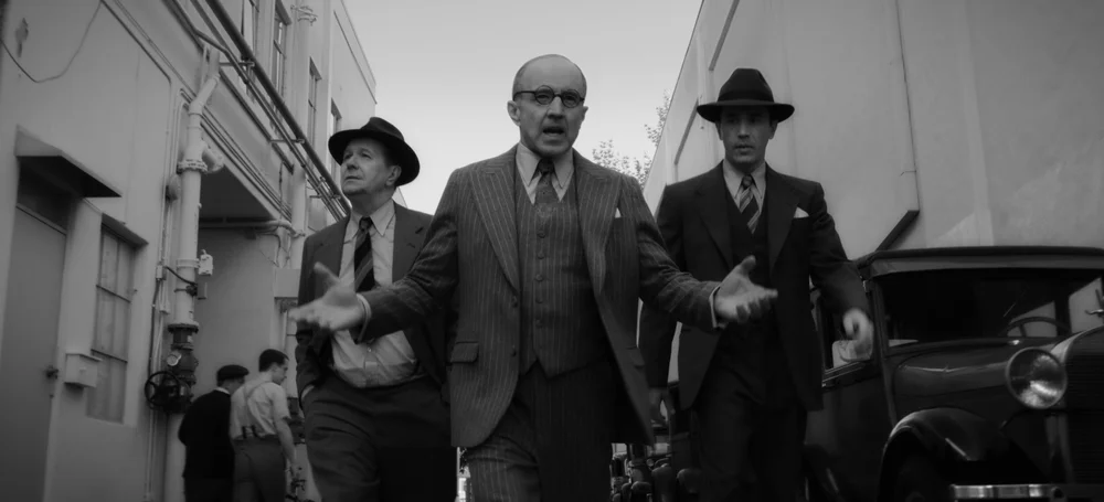  MANK (2020)Gary Oldman as Herman Mankiewicz, Arliss Howard as Louis B. Mayer and Tom Pelphrey as Joe Mankiewicz.NETFLIX 