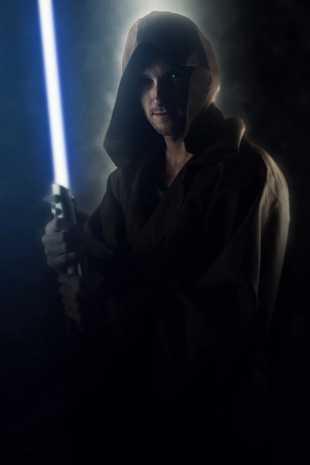 Young warrior holding a lightsaber