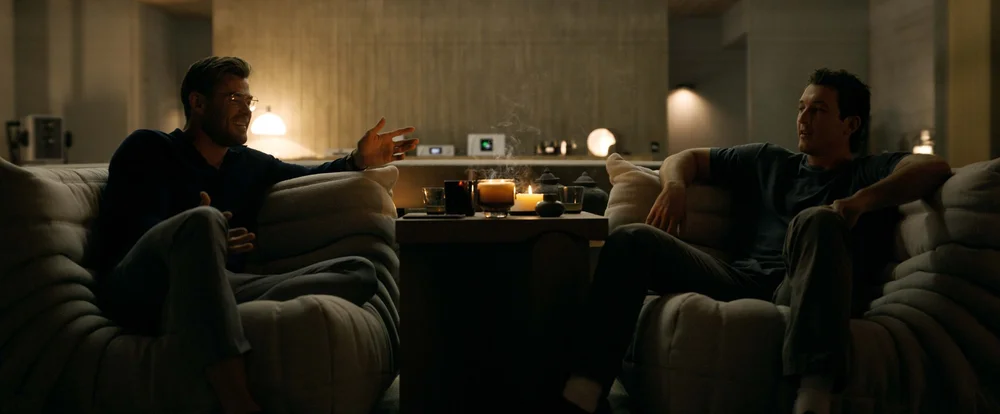 SPIDERHEAD. (L to R) Chris Hemsworth as Abnesti and Miles Teller as Jeff in Spiderhead. Netflix © 2022