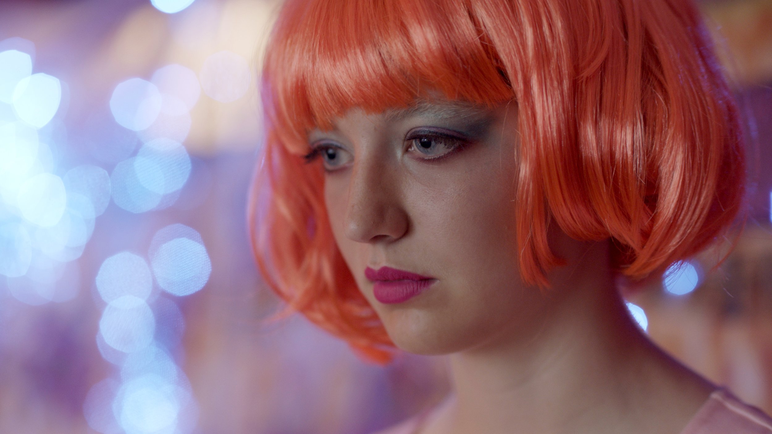 TIGER WITHIN - Margot Josefsohn as Casey in red wig. Photo Courtesy of Menemsha Films (1).jpg