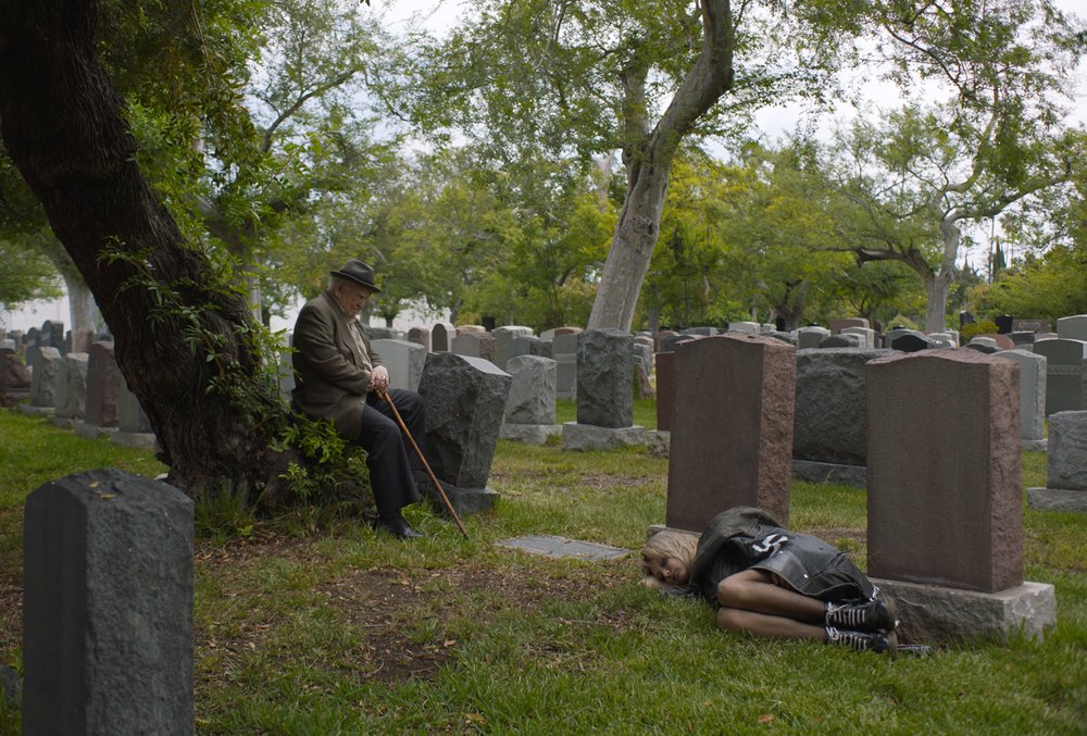 TIGER WITHIN - Ed Asner as Samuel discovers Margot Josefsohn sleeping in a cemetary. Photo Courtesy of Menemsha Films.jpg