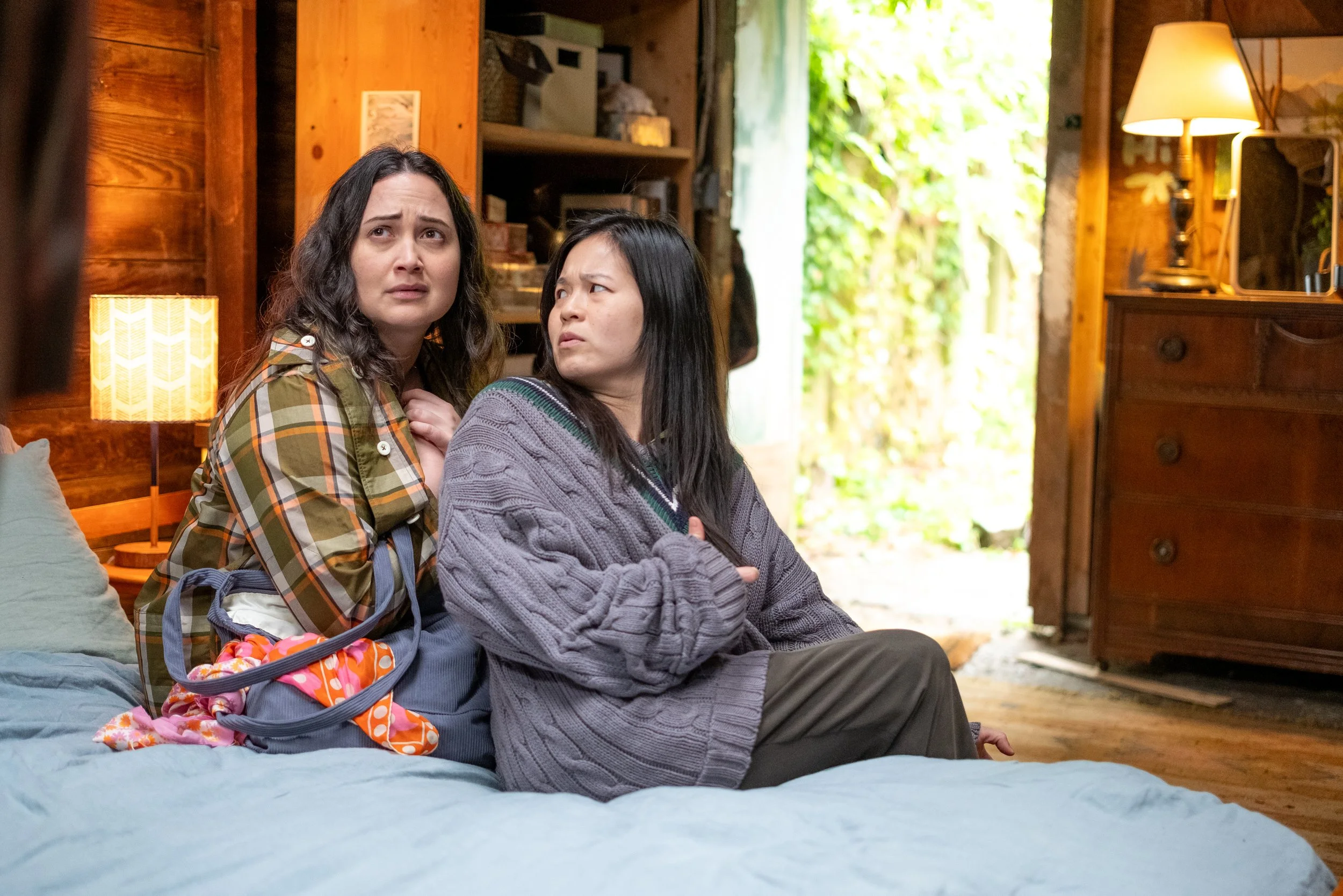 Still 5 - Lily Gladstone and Kelly Marie Tran in THE WEDDING BANQUET credit Luka Cyprian Bleecker Street.jpg.jpg