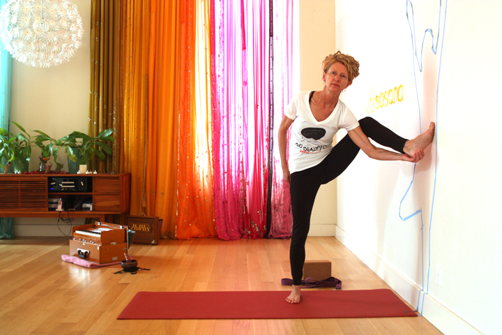 Take your hand to your heel and draw the shoulder closer to the inner knee.