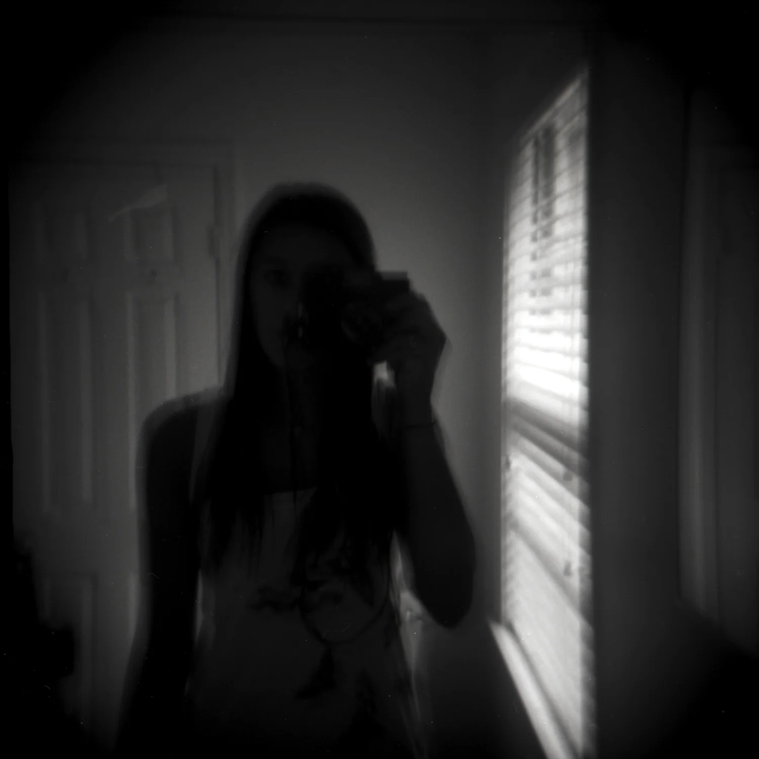 self reflected in mirror holga bw.jpg