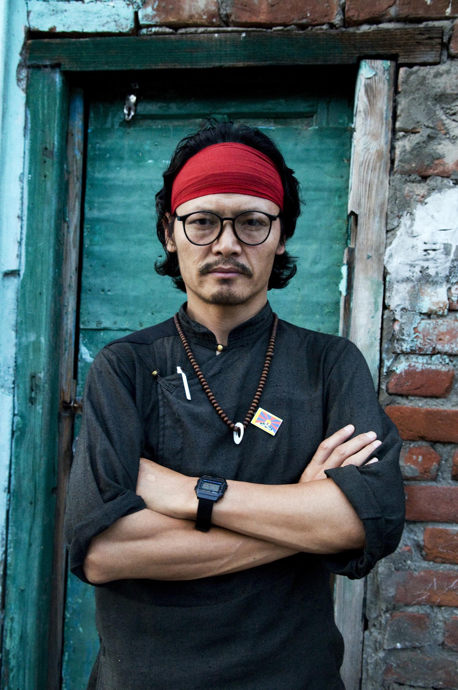 Tibetan activist and writer Tenzin Tsundue is known for his darig protests including scaling 14 floors of a Mumbai hotel to unveil a "Free Tibet" banner in 2005.