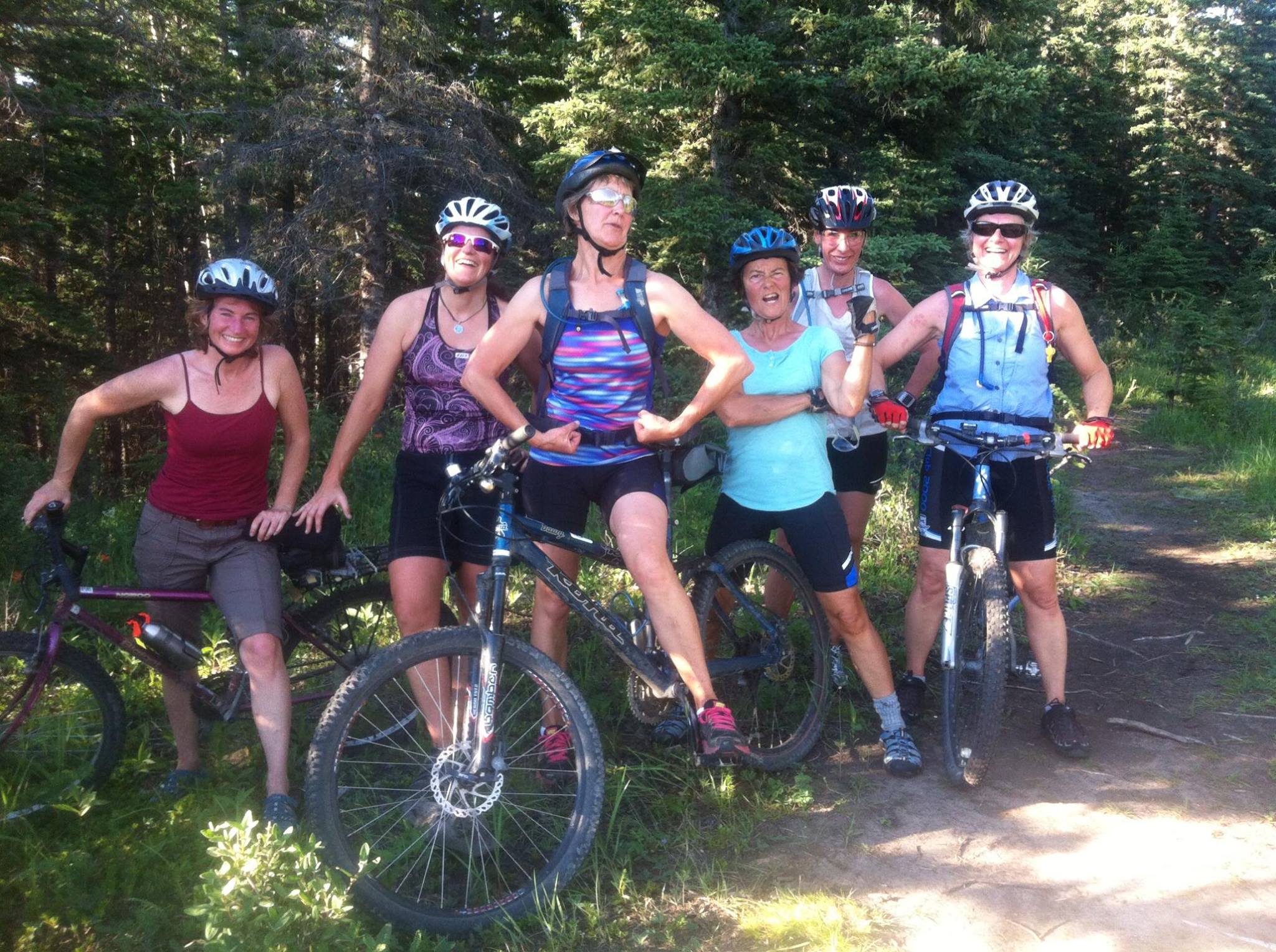 The "we are strong and can ride anything" pose.