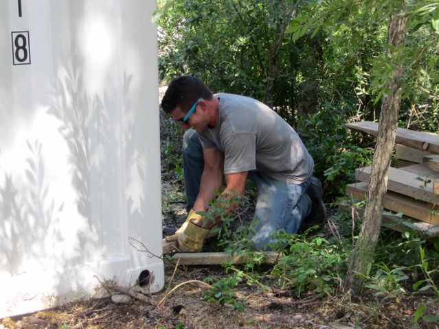 Tyson working on the installation