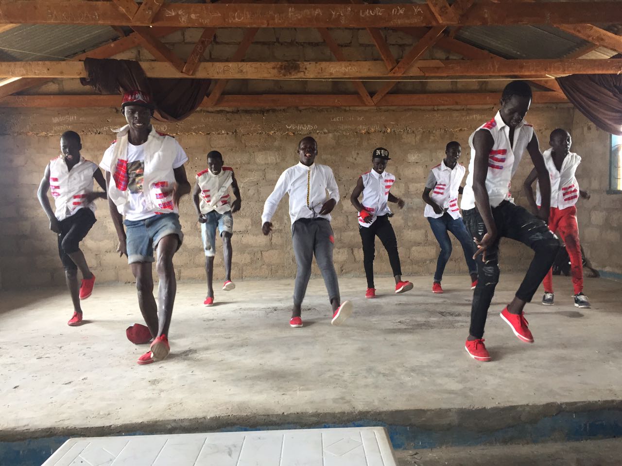 Today there are many more primary schools, secondary schools and youth programs, which are educating thousands of refugees from South Sudan. One of these programs is the Youth and Culture Program that Valentino helped to run when he was there. (Above: A well-known youth dance troupe performs the welcoming dance.) 