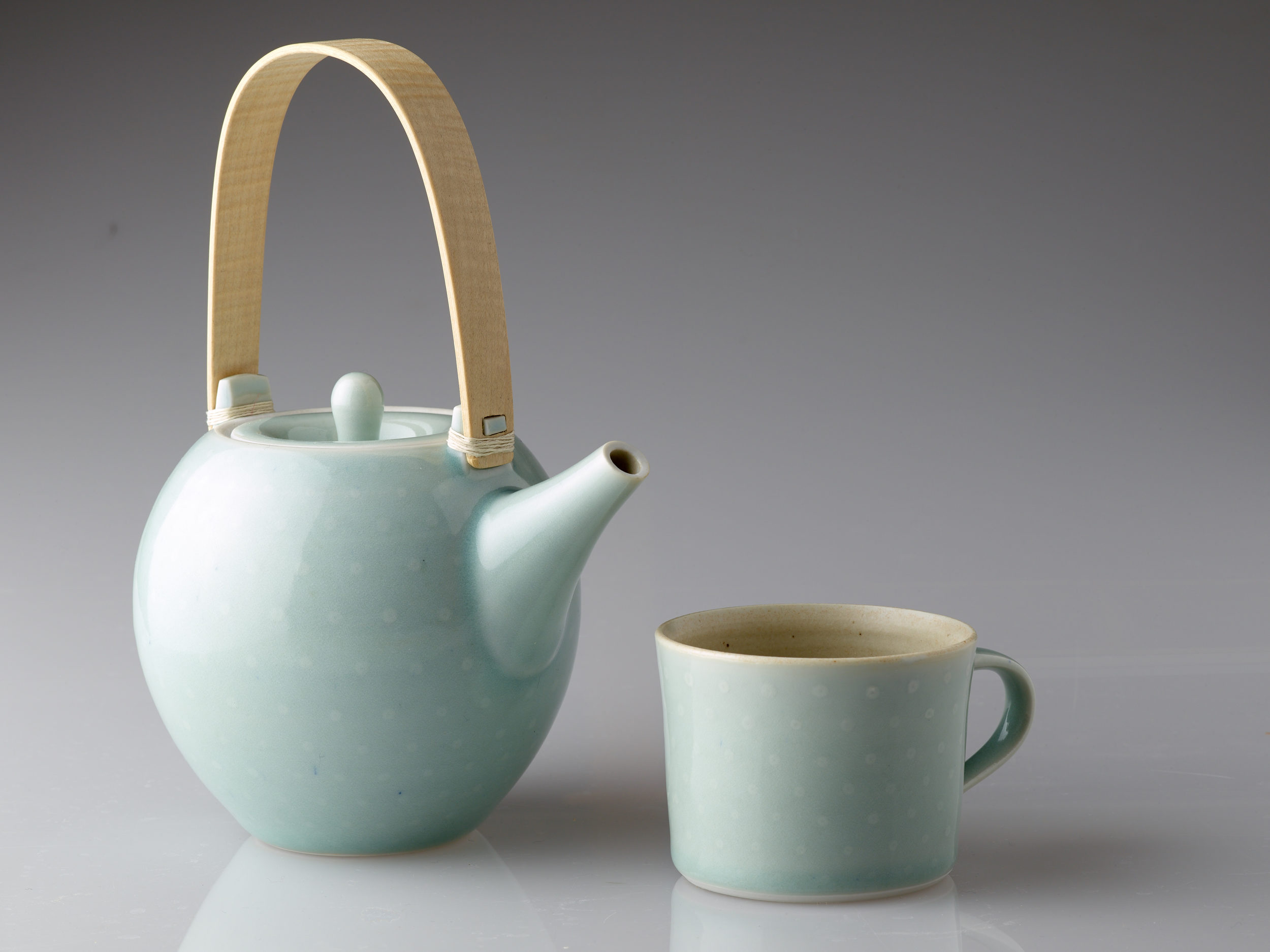 Celadon spot teapot with rippled maple handle