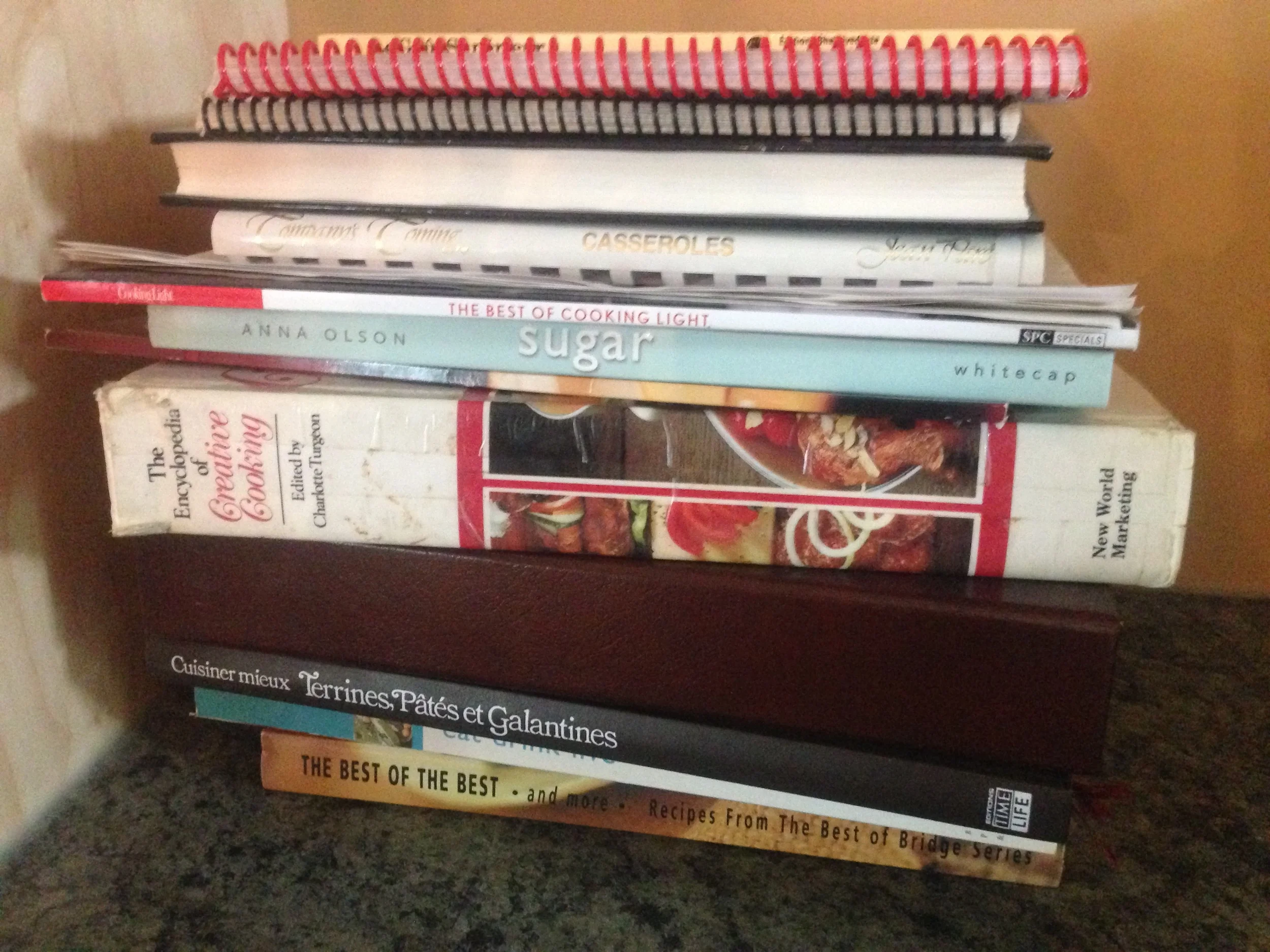 I can't believe I kept so many cookbooks I never used. My mother's rule: only keep the "sticky" ones. They're the ones you're actually using. The ones with all the sticky notes I got rid of? Not one of them had a smudge on it.