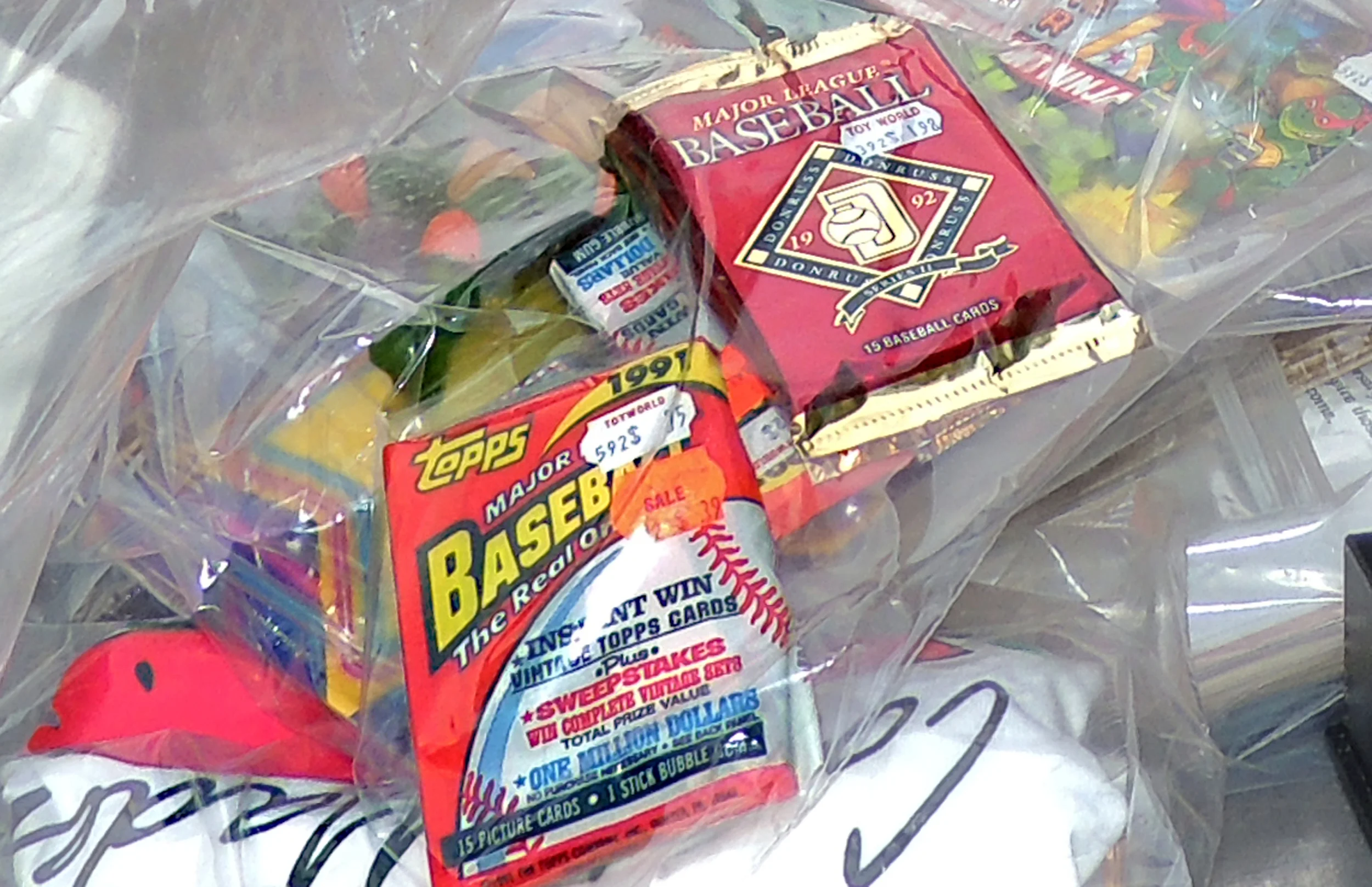 BASEBALL CARDS PURCHASED AT TOY WORLD. 25 YEARS LATER, THEY'RE STILL COLLECTIBLES